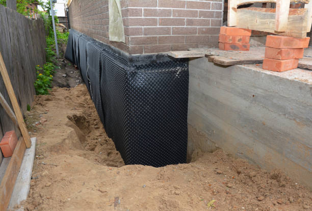 Happy homeowners after waterproofing job in Cambridge City